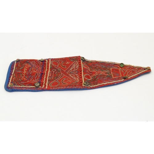 1251 - An early 20thC needlework wall pocket for keeping sewing accessories, decorated with cabochon style ... 