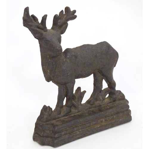 1253 - A 20thC cast doorstop / door porter modelled as a stag. Approx. 8 1/4