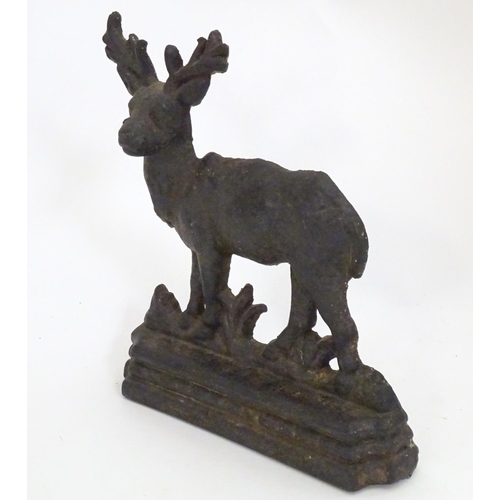 1253 - A 20thC cast doorstop / door porter modelled as a stag. Approx. 8 1/4