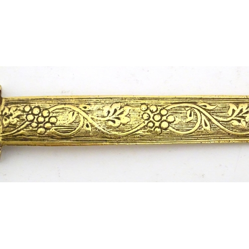 1278 - An early 20thC brass letter opener with classical head finial and grape and vine detail to blade. Ap... 