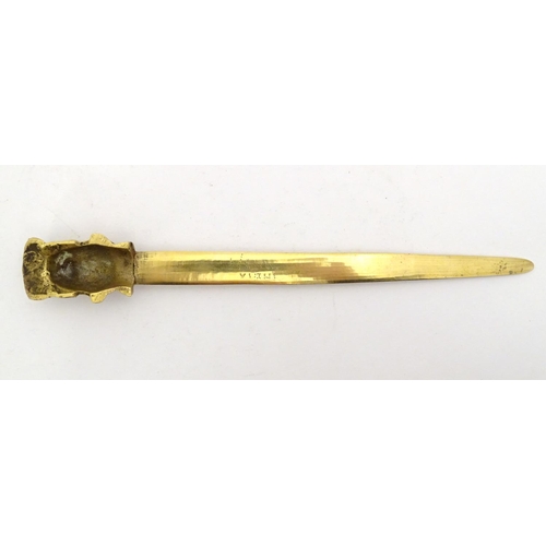 1278 - An early 20thC brass letter opener with classical head finial and grape and vine detail to blade. Ap... 