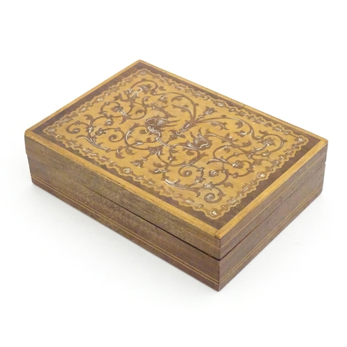 1331 - A 20thC parquetry box with scrolling foliate and stylised bird detail. Approx. 1 1/2