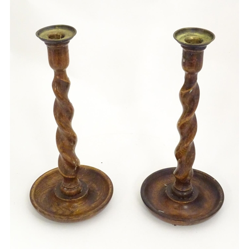 1362 - A pair of late 19th / early 20thC candlesticks with barley twist columns. Approx. 11 3/4