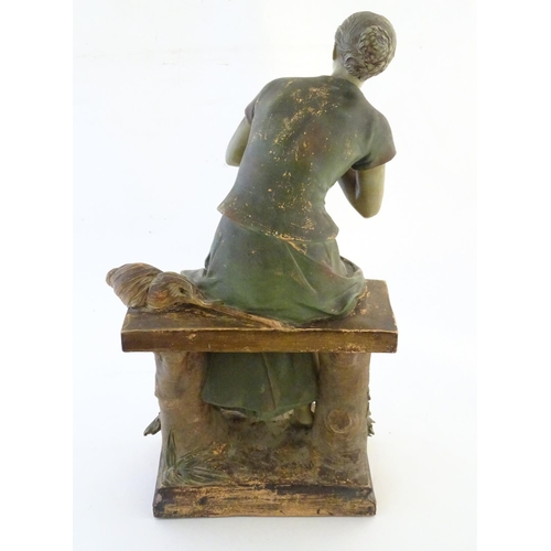 1367 - A 20thC French terracotta sculpture of a seated woman on a bench after Luca Madrassi (1849-1919), si... 