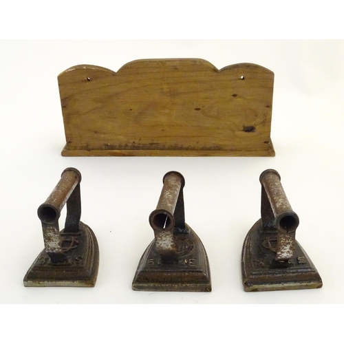 1462 - Three 19thC sad irons / flat irons, two marked with CU cypher and size designations 5 S & 3 S, anoth... 