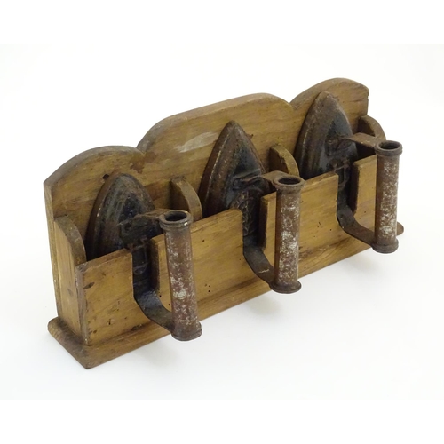 1462 - Three 19thC sad irons / flat irons, two marked with CU cypher and size designations 5 S & 3 S, anoth... 