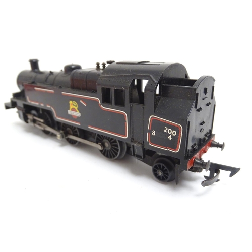 1523 - Toys: A trio of Triang Railways OO gauge models, comprising an R59 2-6-2 Tank Loco black livery (box... 