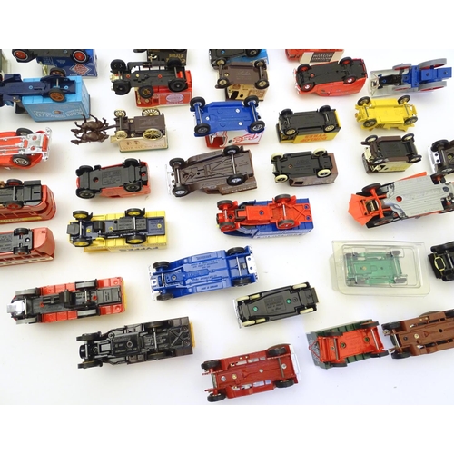 1527 - Toys: A large quantity of assorted die cast scale model cars / vehicles to include, advertising Matc... 