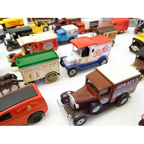 1527 - Toys: A large quantity of assorted die cast scale model cars / vehicles to include, advertising Matc... 