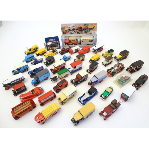 1527 - Toys: A large quantity of assorted die cast scale model cars / vehicles to include, advertising Matc... 