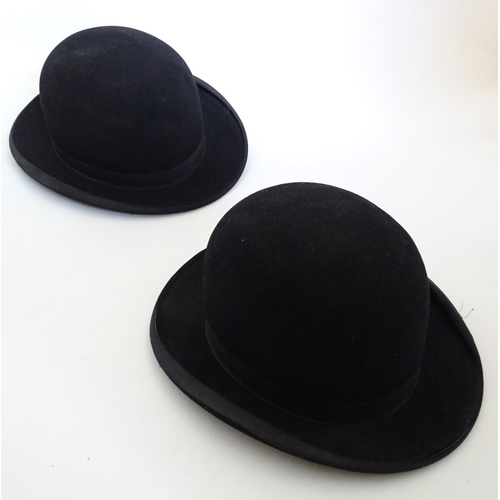 1555 - Two vintage black bowler hats, size 7 and size 12. One impressed to inner rim The Ideal, the other i... 