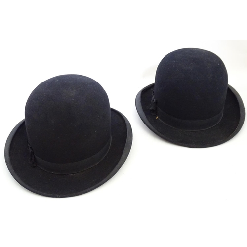 1555 - Two vintage black bowler hats, size 7 and size 12. One impressed to inner rim The Ideal, the other i... 