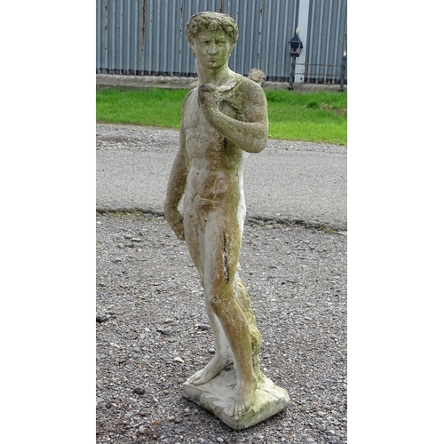 1586 - Garden & Architectural, Salvage: a 20thC reconstituted stone statue formed as Michaelangelo's David,... 