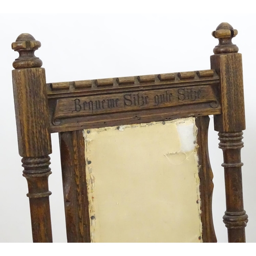 2098 - A pair of 19thC oak Gothic chairs, mounted by carved finials above incised frames with turned suppor... 