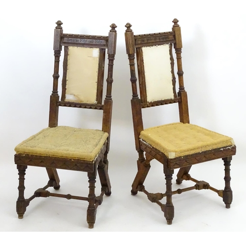 2098 - A pair of 19thC oak Gothic chairs, mounted by carved finials above incised frames with turned suppor... 