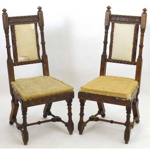 2098 - A pair of 19thC oak Gothic chairs, mounted by carved finials above incised frames with turned suppor... 