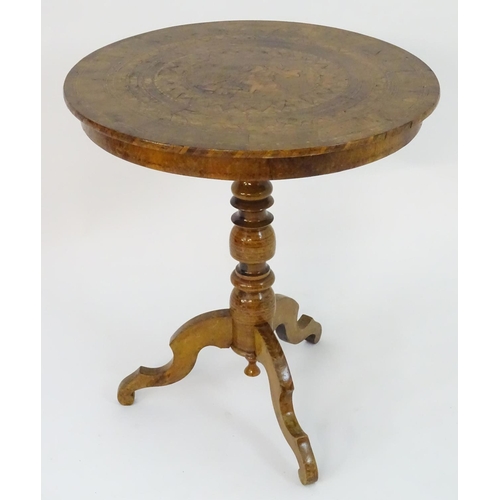 2102 - A 19thC Sorrento table with a profusely inlaid marquetry top and having a turned pedestal base with ... 