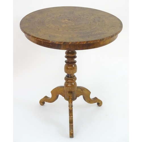 2102 - A 19thC Sorrento table with a profusely inlaid marquetry top and having a turned pedestal base with ... 