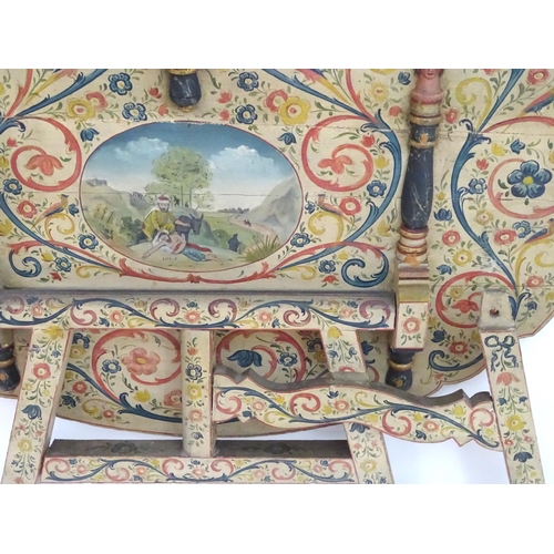 2205 - A 19thC Dutch folding table, having painted decoration and a depiction of the Parable of the Good Sa... 