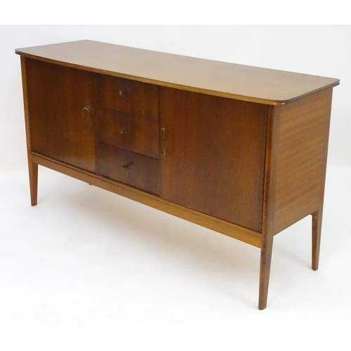 2212 - Vintage retro, Mid-century : Peter Hayward for W.G. Evans (Vanson). A 1950s walnut sideboard fitted ... 