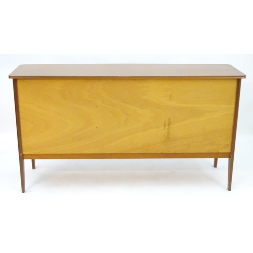 2212 - Vintage retro, Mid-century : Peter Hayward for W.G. Evans (Vanson). A 1950s walnut sideboard fitted ... 