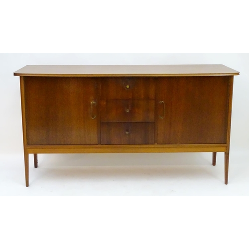 2212 - Vintage retro, Mid-century : Peter Hayward for W.G. Evans (Vanson). A 1950s walnut sideboard fitted ... 