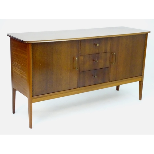 2212 - Vintage retro, Mid-century : Peter Hayward for W.G. Evans (Vanson). A 1950s walnut sideboard fitted ... 