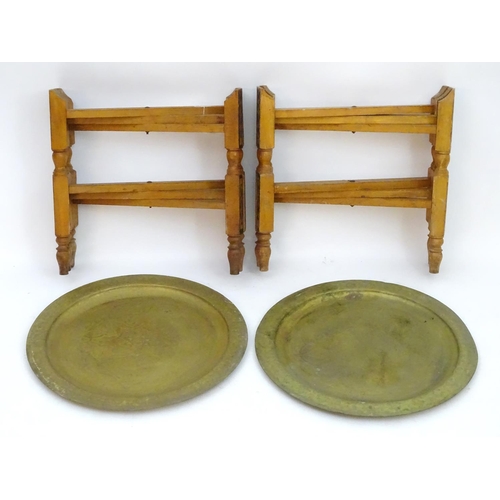 2216 - A pair of early 20thC brass top tables with incised tray tops and painted folding bases. 21 1/4