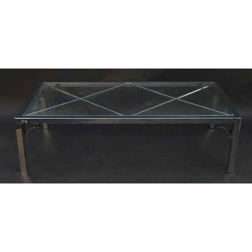 2218 - Vintage Retro mid Century modern: A large chromed and glass topped coffee table with cross bracing, ... 