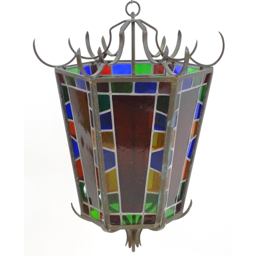 2243 - An early 20thC exceptionally large stained glass pendant lantern / light shade, of tapering hexagona... 