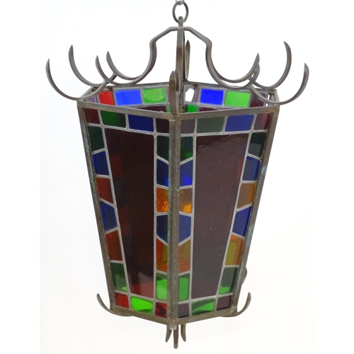 2243 - An early 20thC exceptionally large stained glass pendant lantern / light shade, of tapering hexagona... 