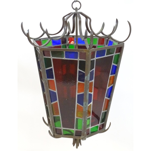 2243 - An early 20thC exceptionally large stained glass pendant lantern / light shade, of tapering hexagona... 