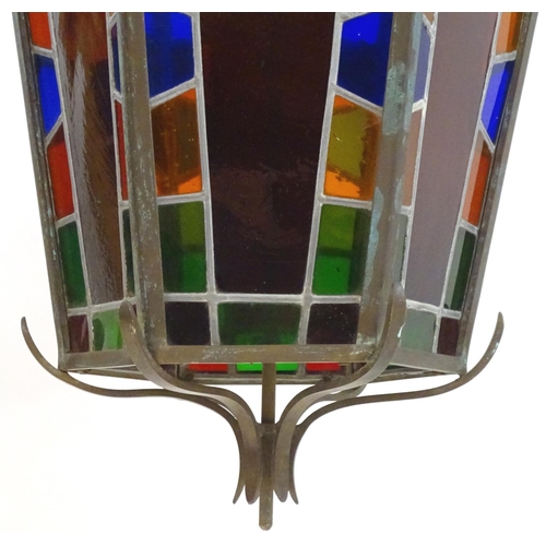 2243 - An early 20thC exceptionally large stained glass pendant lantern / light shade, of tapering hexagona... 