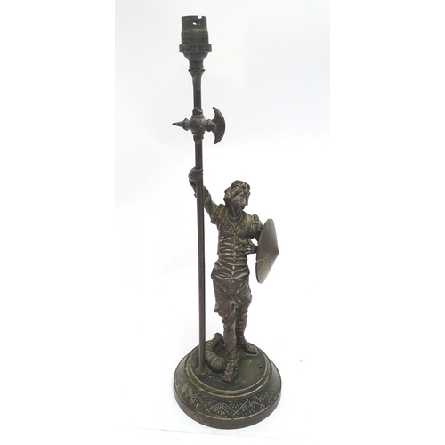 2255 - A Victorian cast figural table lamp, formed as Don Quixote, stamped to the reverse, the base with re... 