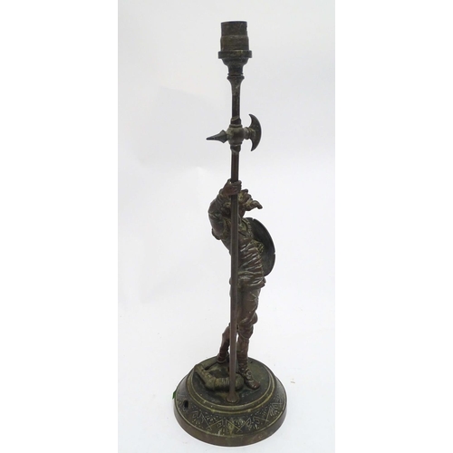 2255 - A Victorian cast figural table lamp, formed as Don Quixote, stamped to the reverse, the base with re... 