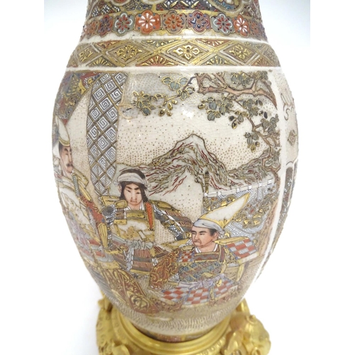 2260 - An early 20thC Satsuma vase table light, with ornate gilt base and light fitting, 20 1/2