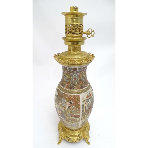 2260 - An early 20thC Satsuma vase table light, with ornate gilt base and light fitting, 20 1/2