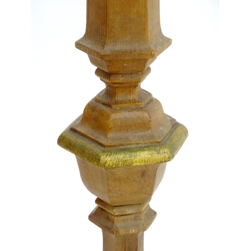 2262 - A 20thC pine standard lamp, of hexagonal stepped sectional form, with gilt edging and faux candle to... 