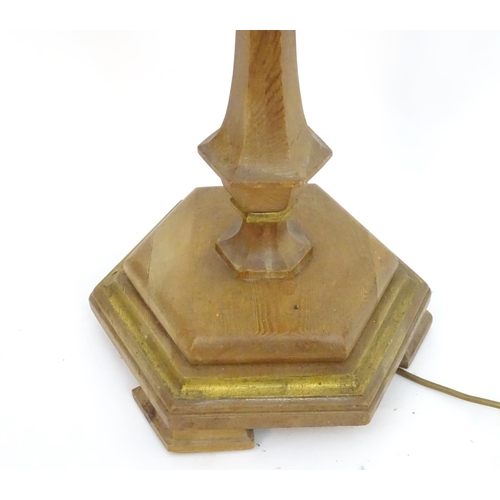 2262 - A 20thC pine standard lamp, of hexagonal stepped sectional form, with gilt edging and faux candle to... 