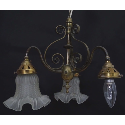 2267 - An early 20thC pendant three branch ceiling light , the brass mount with scroll decoration, stamped ... 