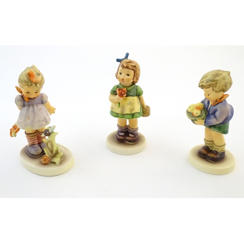 132 - Twelve exclusive / special edition Hummel / Goebel figures to include Darling Duckling, no. 1846, At... 