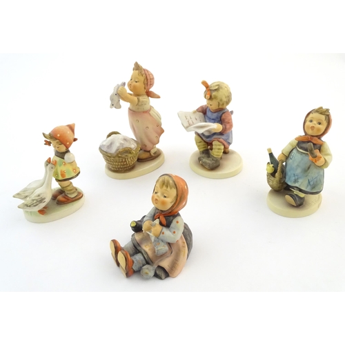 133 - Five Hummel / Goebel figures comprising Happy Pastime, no. 69, What's New?, no. 418, Goose Girl, no.... 