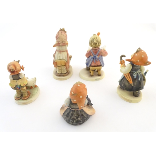 133 - Five Hummel / Goebel figures comprising Happy Pastime, no. 69, What's New?, no. 418, Goose Girl, no.... 