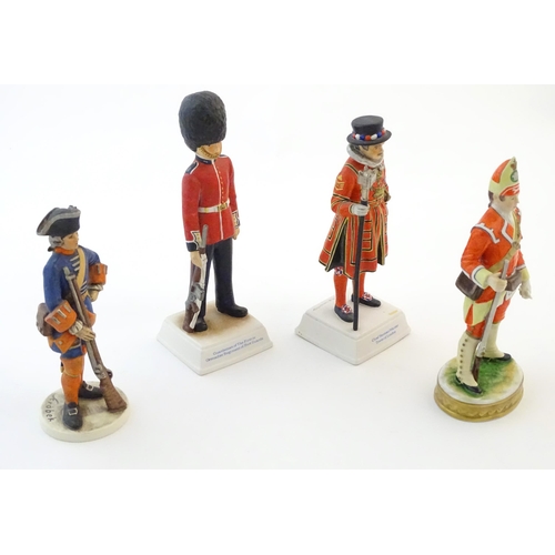 142 - Three Goebel military / soldier / guard figures comprising Chief Yeoman Warder Tower of London, no. ... 