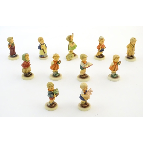 143 - Eleven Goebel / Hummel Club figures to include Too Shy to Sing, no. 845, Puppet Prince, no. 2103/B, ... 