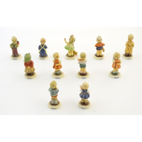 143 - Eleven Goebel / Hummel Club figures to include Too Shy to Sing, no. 845, Puppet Prince, no. 2103/B, ... 