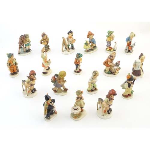 144 - A quantity of Friedel figures to include an artist with palette and easel, a farm boy with a wheelba... 