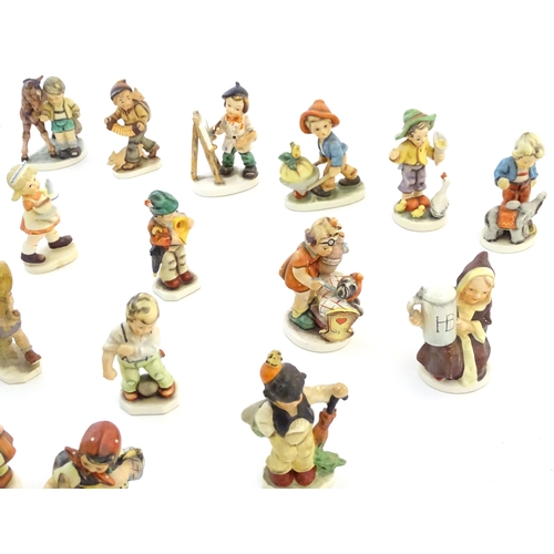 144 - A quantity of Friedel figures to include an artist with palette and easel, a farm boy with a wheelba... 