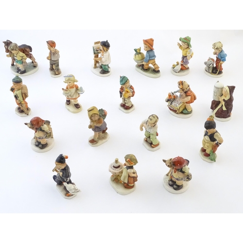 144 - A quantity of Friedel figures to include an artist with palette and easel, a farm boy with a wheelba... 