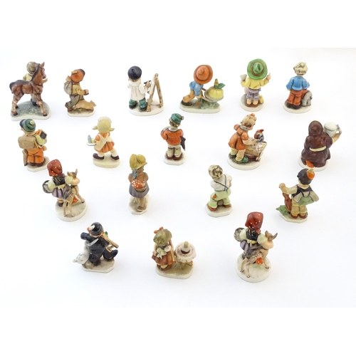 144 - A quantity of Friedel figures to include an artist with palette and easel, a farm boy with a wheelba... 